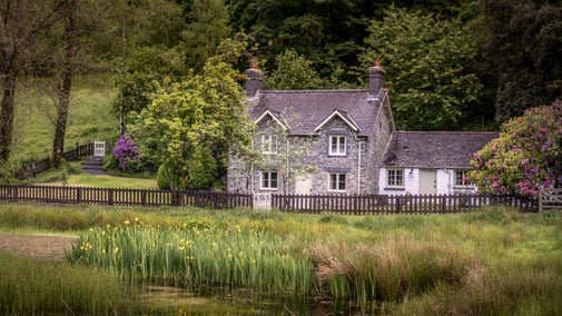 A view of Hawthorn Cottage from across the old duckpond on the Hafod Estate, Ceredigion